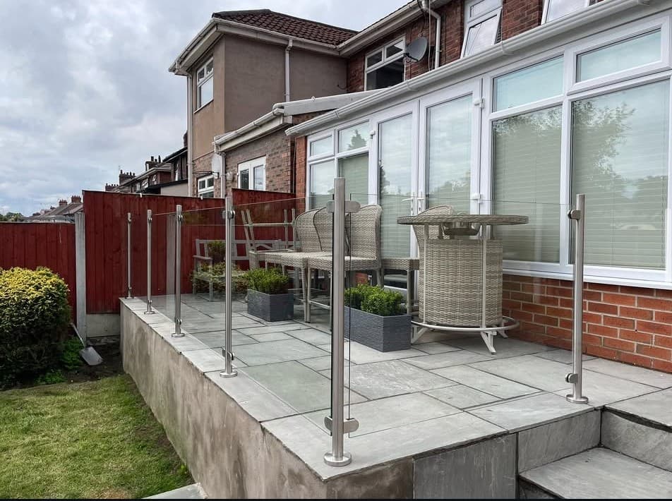 Balcony balustrade installed with steel posts and glass infill