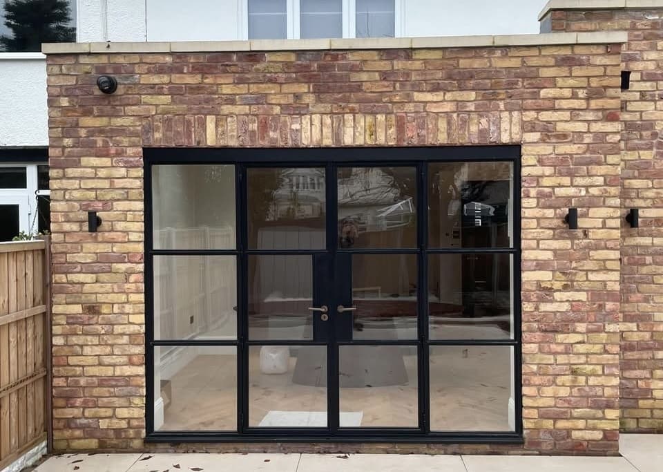 Steel and glass partition screen and room divider